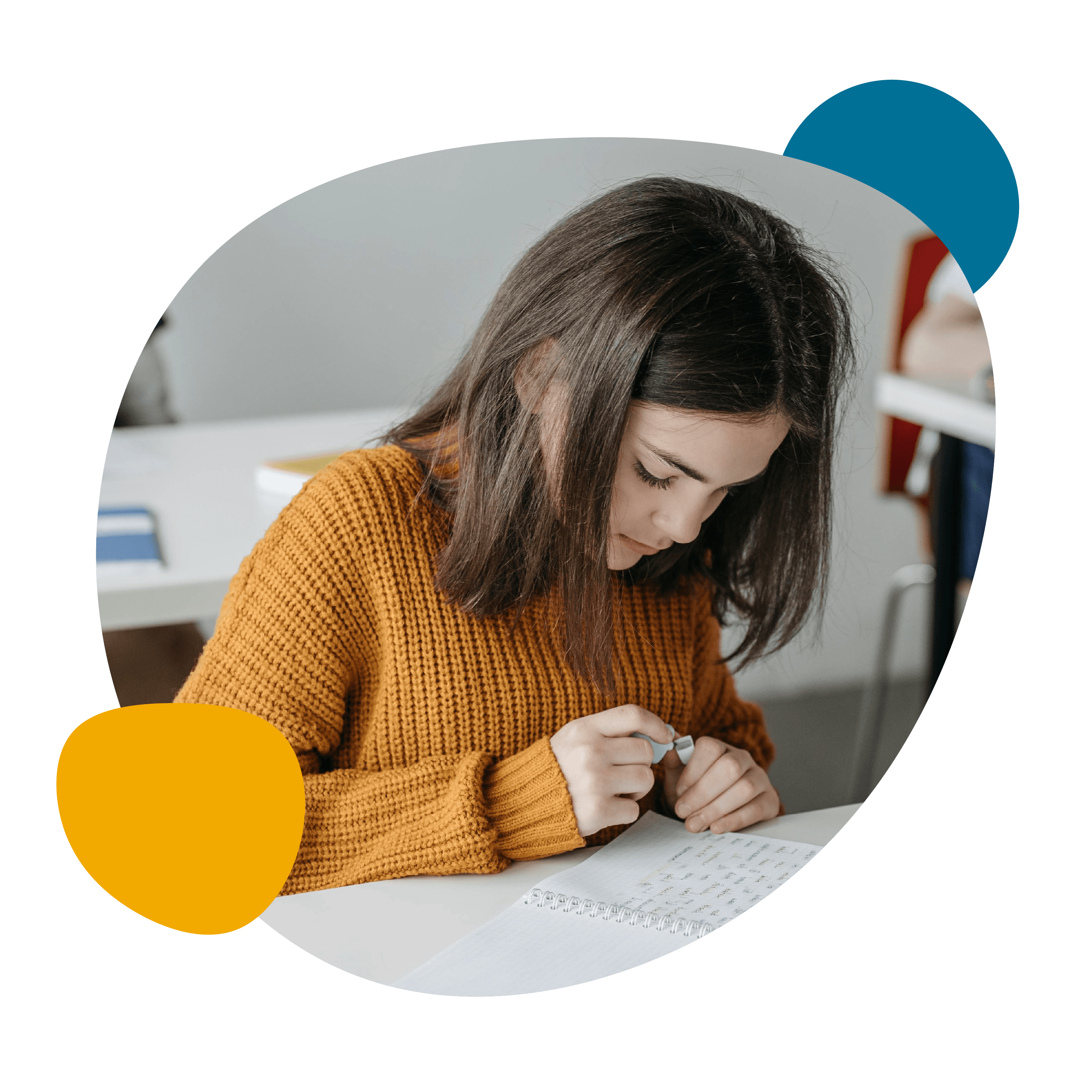 Young girl studying at desk